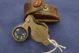 An early Ernst Leitz Wetzlar 10X jewellers loupe with original leather case.