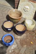 Five various glazed plant pots.