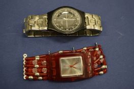 Two stylish wristwatches.