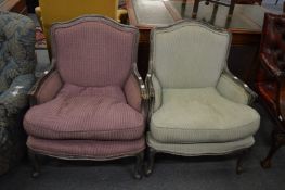 A pair of French style armchairs with silvered frames, one upholstered in green striped fabric the