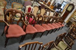 A set of eight Victorian style mahogany dining chairs, two with arms.