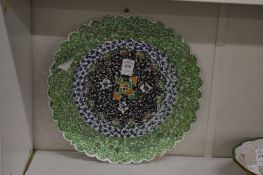 An Eastern enamel dish.