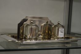 A chrome plated desk stand.