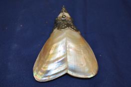 A mother of pearl and white metal mounted scent bottle.