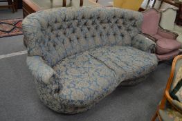 A button upholstered settee.