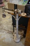 Old fashioned cast iron floor standing weighing scales.