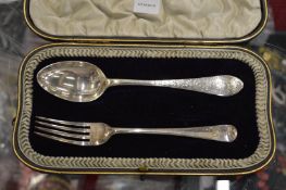 A cased silver Christening set comprising spoon and fork, London 1904.