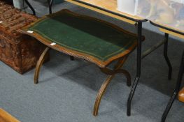 A mahogany and leather inset coffee table.