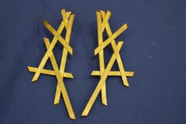 A pair of stylish silver gilt earrings.