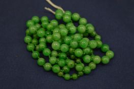 A jade bead necklace.