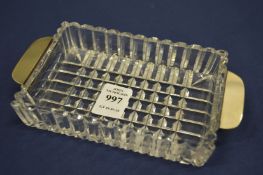 A silver mounted cut glass dish.