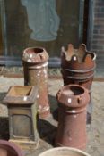 Four old chimney pots.
