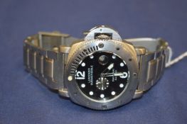 A stainless steel wristwatch.