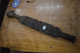 An African carved wood club.