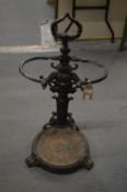 A Victorian cast iron stick stand.