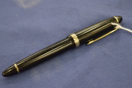 A Sailor fountain pen with 24ct gold nib.