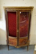 A French ormolu mounted vitrine cabinet (lacking one glazing panel).