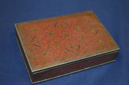 An enamel decorated cigarette box.