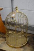 A bird cage style tea light holder.
