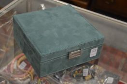 A suede jewellery box.