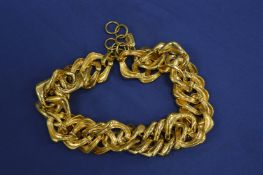 A Yves Saint Laurent necklace.