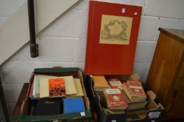 A reproduction Surrey map book and various other books.