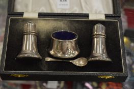 A cased silver three piece cruet set, Birmingham 1971.