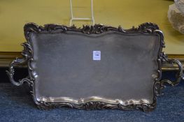 A good ornate rectangular twin handled plated tray with cast border.