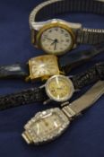 A group of four ladies wristwatches.