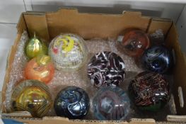 A collection of Murano and other glass paperweights etc.