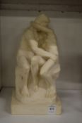 Moulded resin model of Rodin's The Kiss.