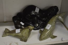 A collection of Inuit hard stone carvings.