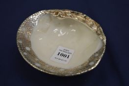 A silver mounted shell dish.