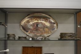 A plated twin handled oval tray and a quantity of plated place mats etc.