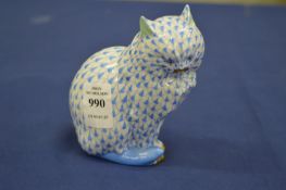 A Herend porcelain figure of a cat, blue fish scale decoration.