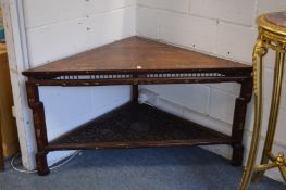 An unusual Chinese corner table with inlaid decoration, the under-tier with carved and pierced