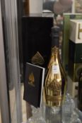 A bottle of Armand De Brignac Ace of Spades Champagne with original box.