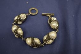 Pearl and diamante bracelet.