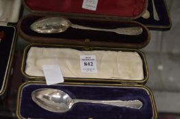 Two cased silver spoons.