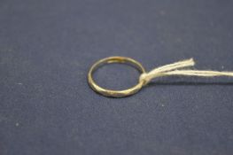 A small platinum wedding band.