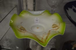 An enamel decorated Islamic moulded glass dish.