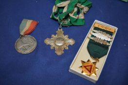A Konigin 1937 medal and ribbon etc.