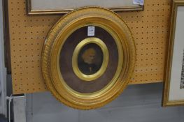 Miniature portrait of an elderly gentleman in a decorative gilt frame, oval.
