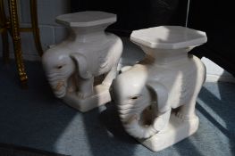 A pair of blanc de chine elephant seats.