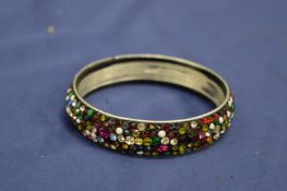 A decorative bangle.