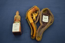 Cased meerschaum pipe and a Chinese seal.