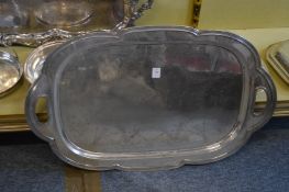A good large twin handled tray with engraved decoration.