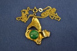 A 9ct gold chain with yellow metal pendant.