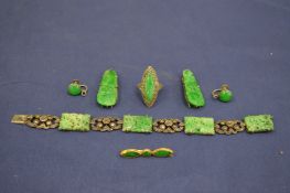 Various jade jewellery.
