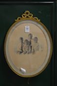 An ormolu oval photograph frame.